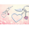 Porte-clés double coeur "LOVE IS IN THE AIR" gravé